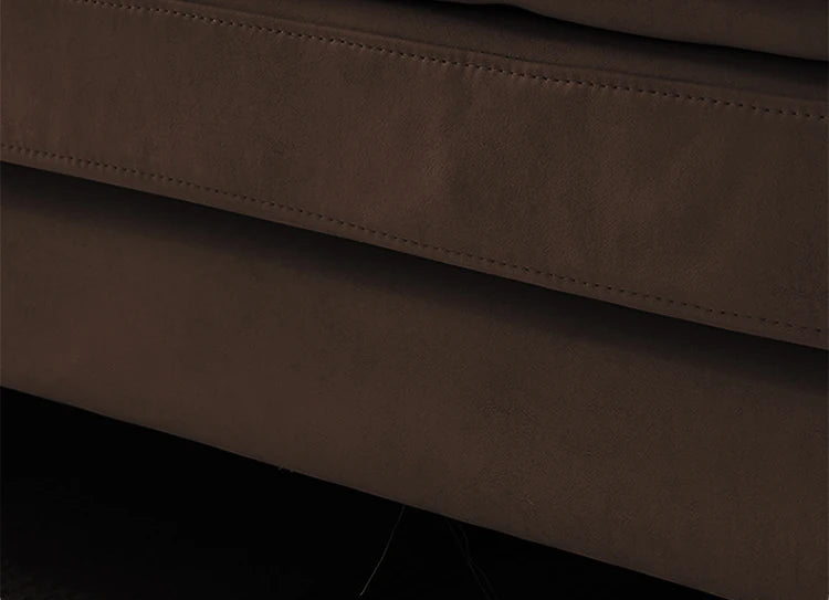 Close-up of brown fabric with a focus on texture and color.