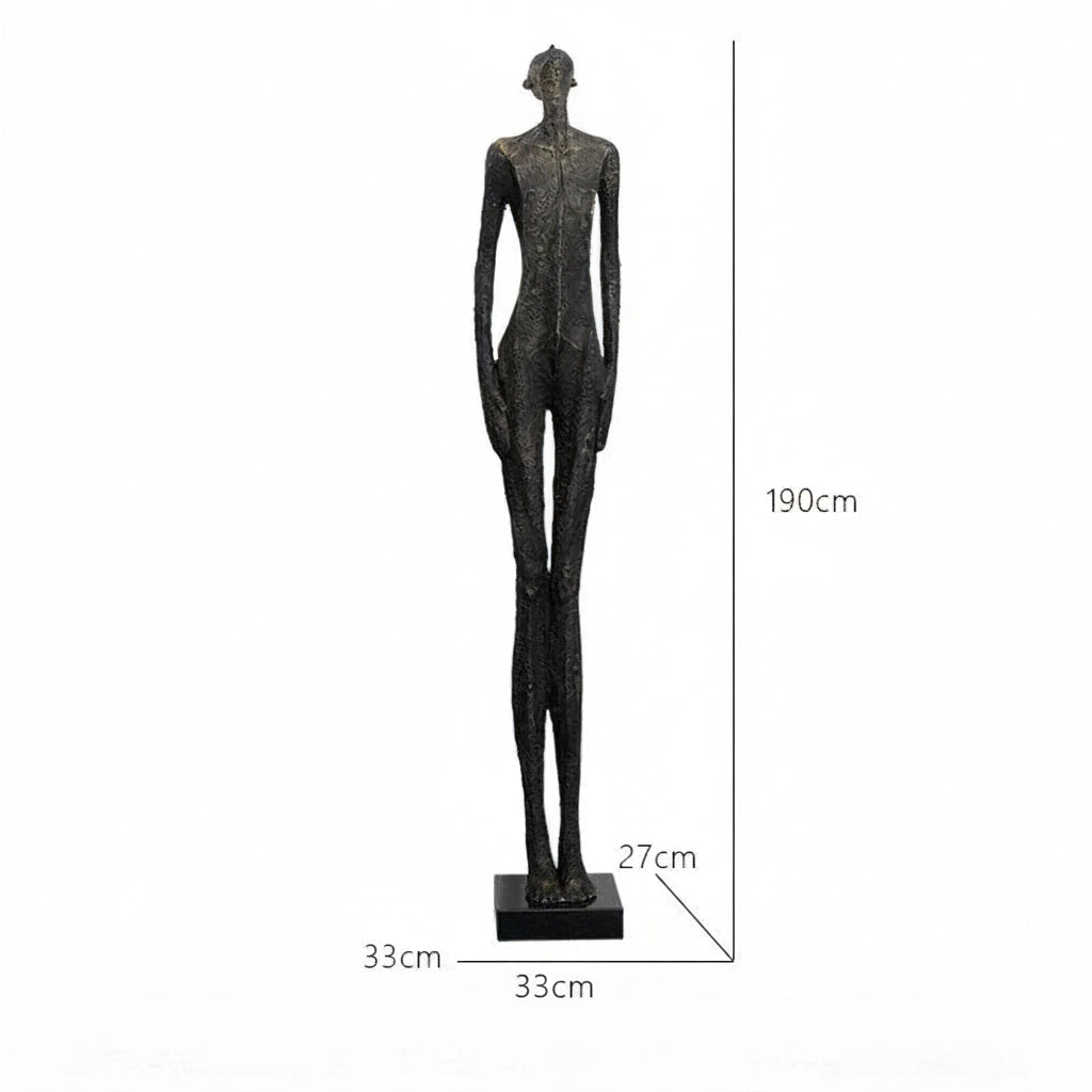 Black sculpture of a humanoid figure with dimensions labeled on a white background