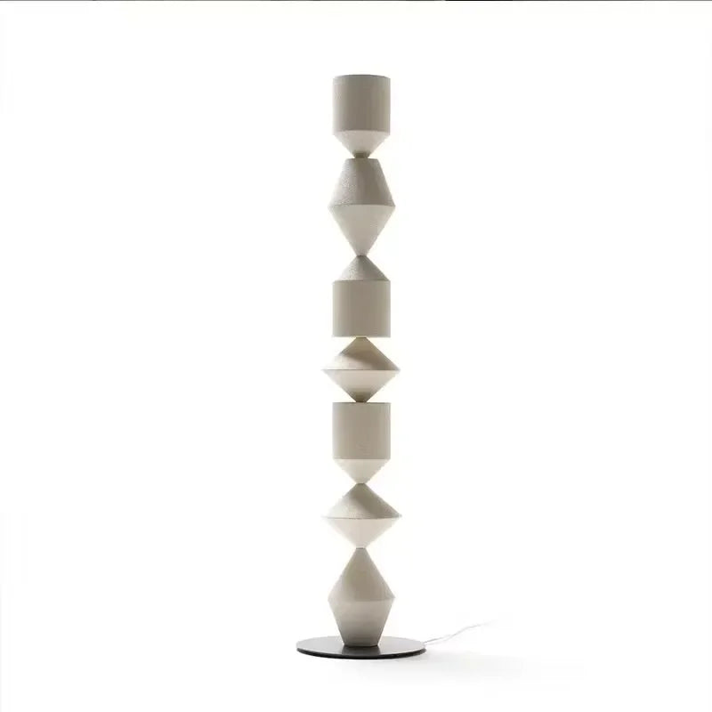 Modern floor lamp with geometric design on a white background