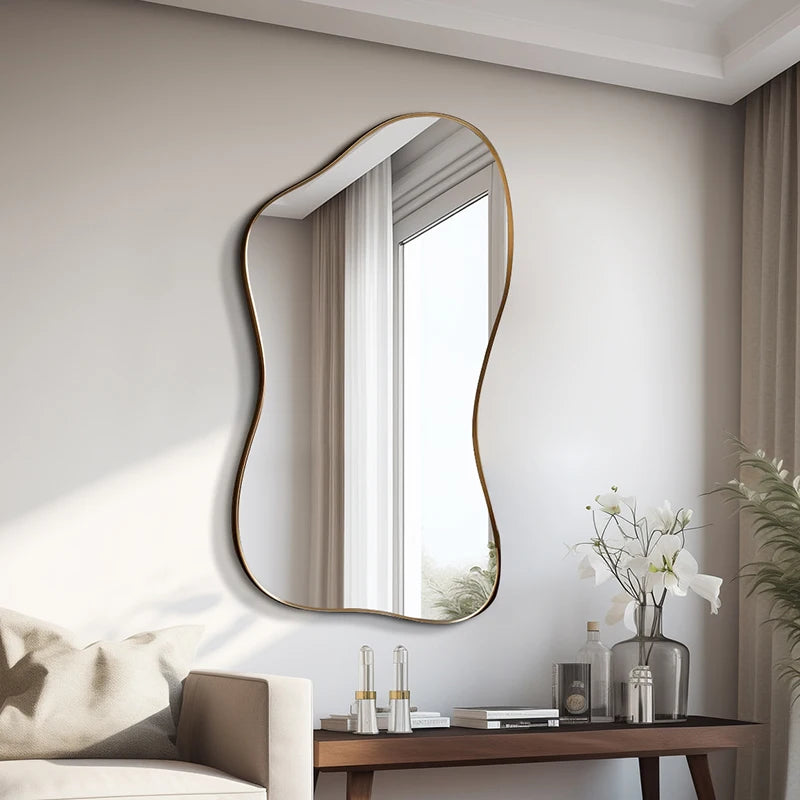 Modern wall mirror with wavy frame on a neutral wall