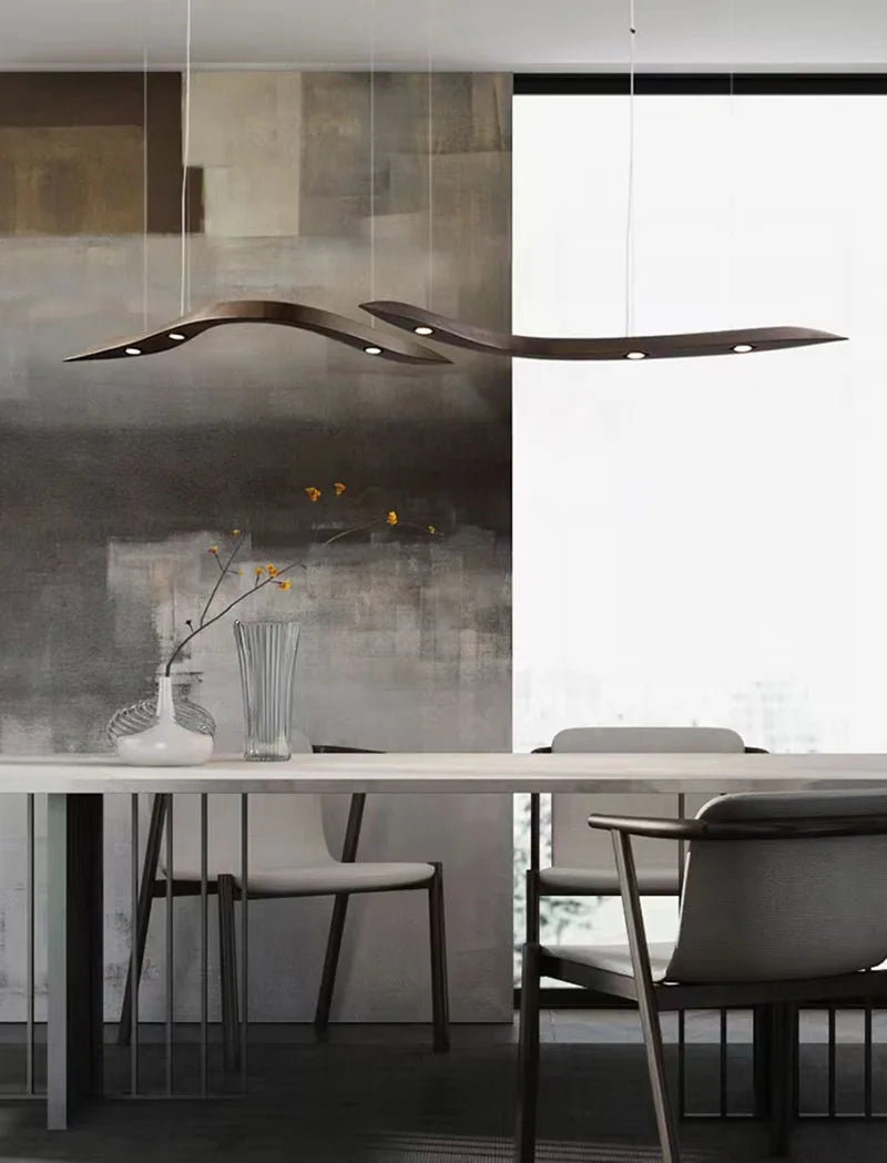 Modern dining room with a large abstract painting on the wall.