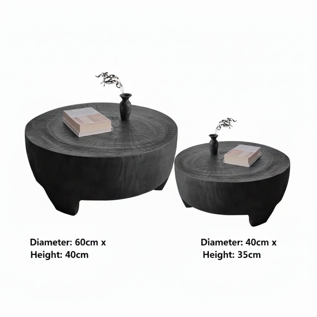 Two wooden coffee tables with decorative items on a white background