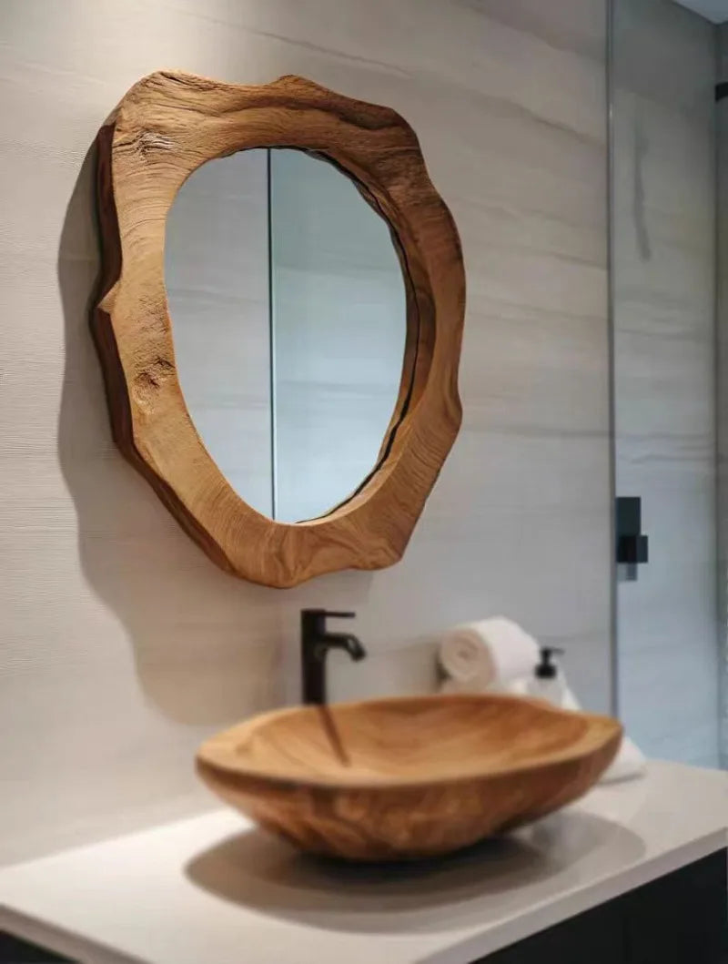 Wooden sink and mirror in a bathroom setting