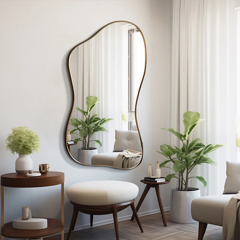 Modern interior with a wavy mirror, plants, and a chair.