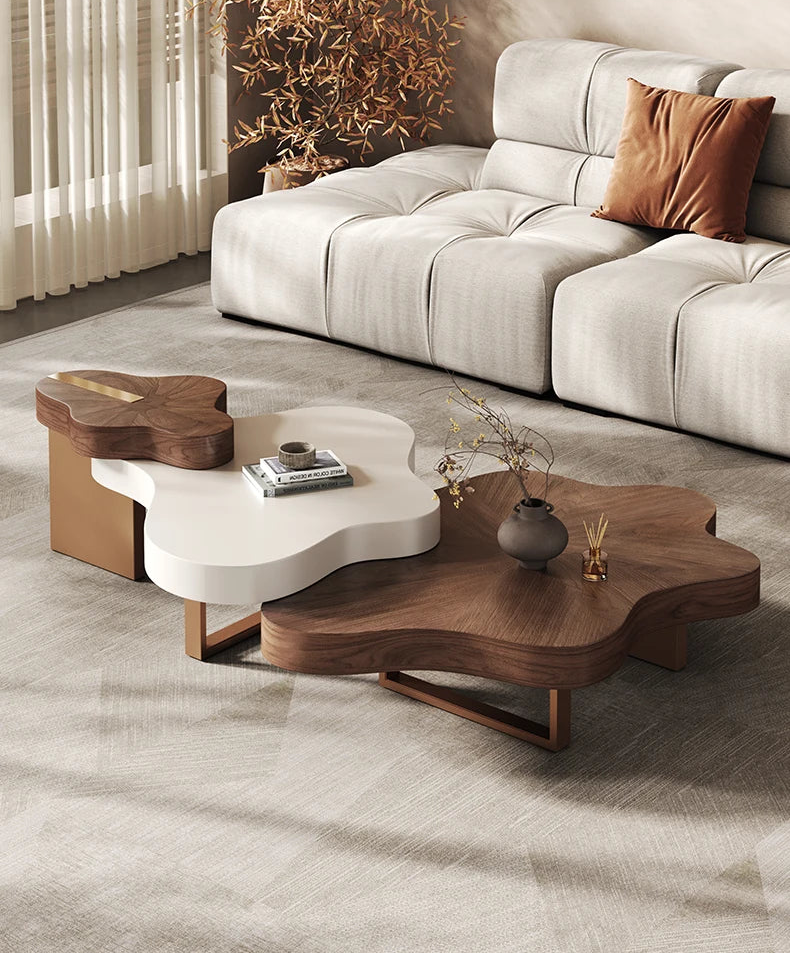 Modern living room with a white sofa and a unique wooden coffee table.