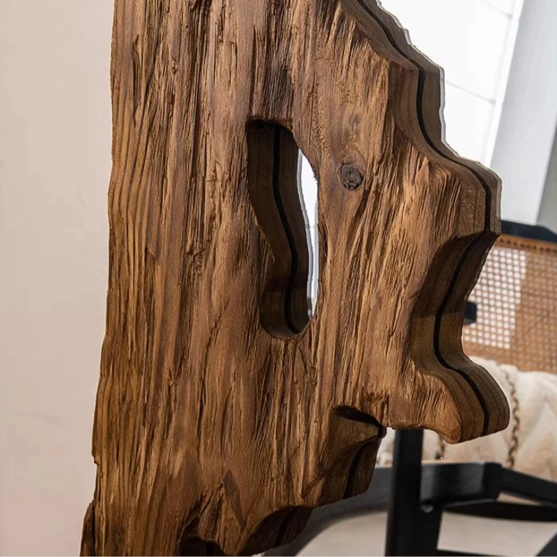 Wooden side table with a natural, wavy edge design.