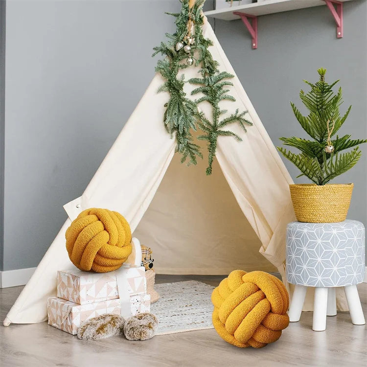 Children's play tent with decorative elements in a room setting
