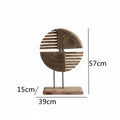 Wooden decorative piece with dimensions on a white background