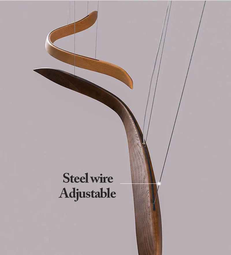 Wooden bow with adjustable steel wire on a gray background