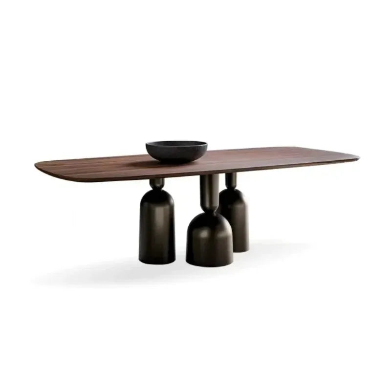 Modern coffee table with wooden top and black cylindrical legs on a white background