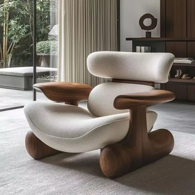 Modern chair with wooden legs in a room with a glass wall and furniture.