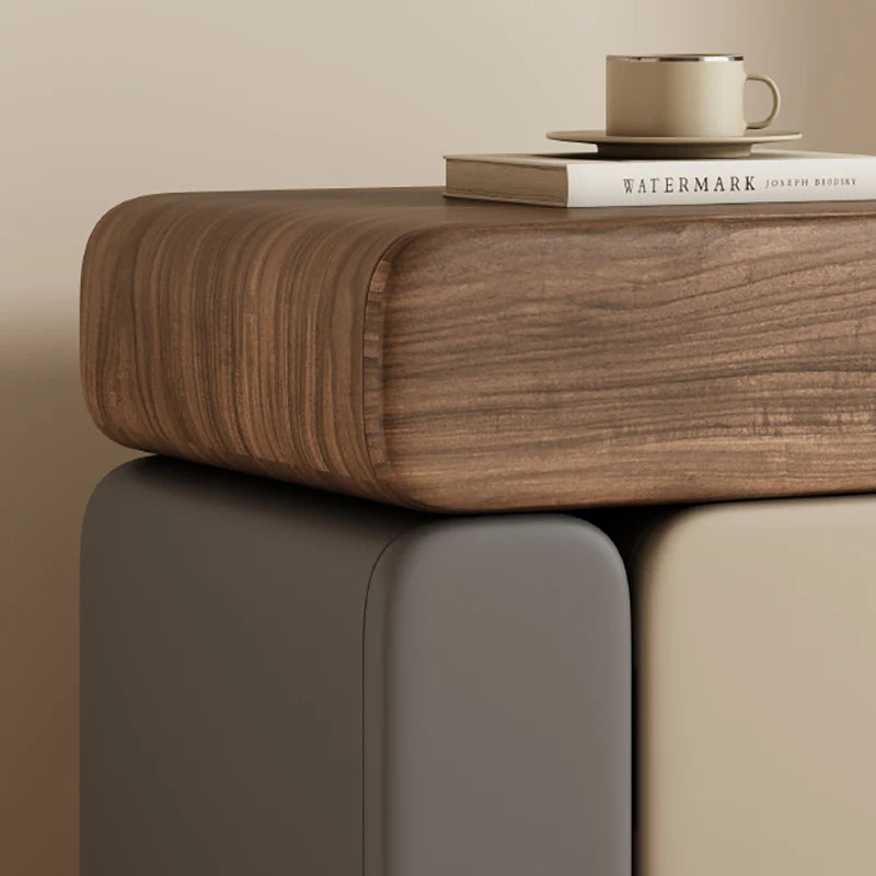 Wooden side table with a book and mug on a neutral background