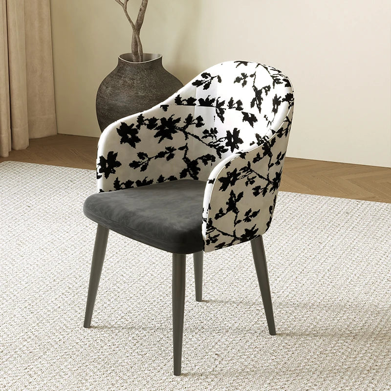Chair with black floral pattern on a white background