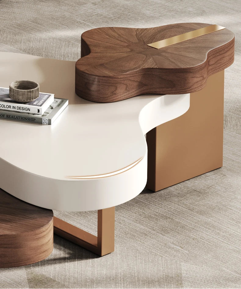 Modern coffee table with wooden top and white base on a gray floor.