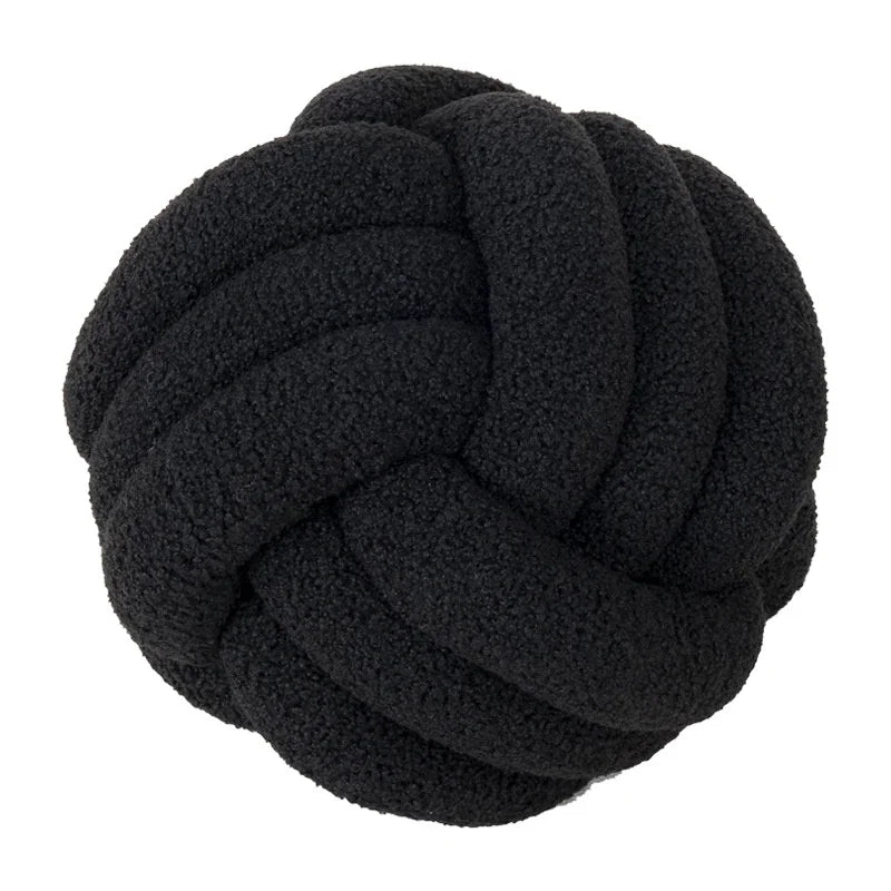 Black knotted ball on a white background