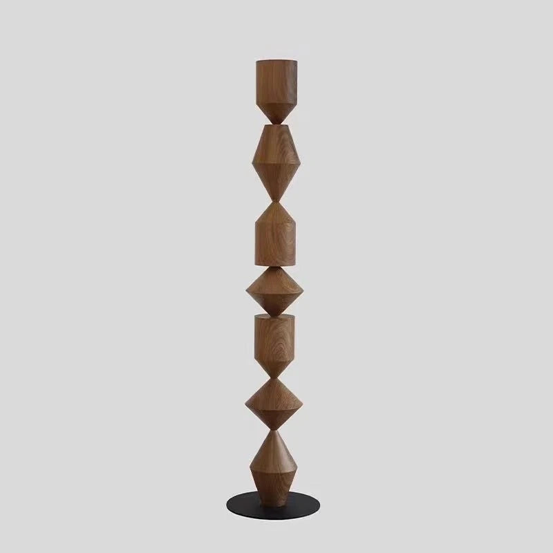 Wooden floor lamp with geometric design on a white background