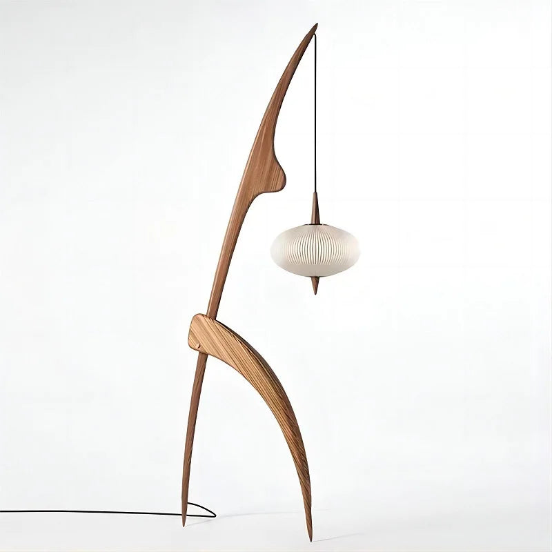 Modern pendant light with wooden arm and white lampshade on a white background