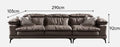 Gray sofa with dimensions labeled in centimeters