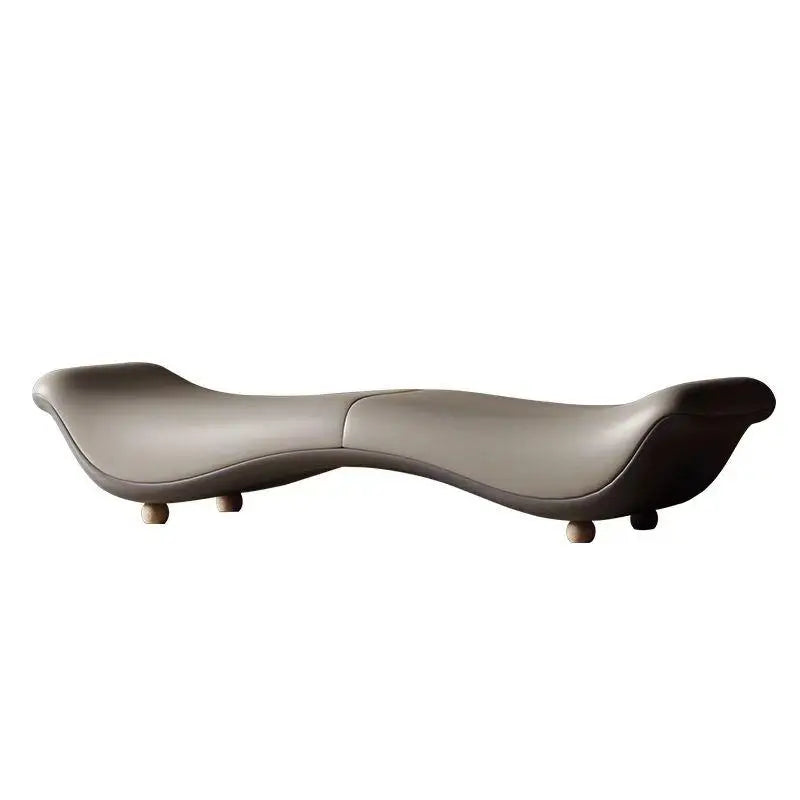 Modern, wavy-shaped bench on a white background
