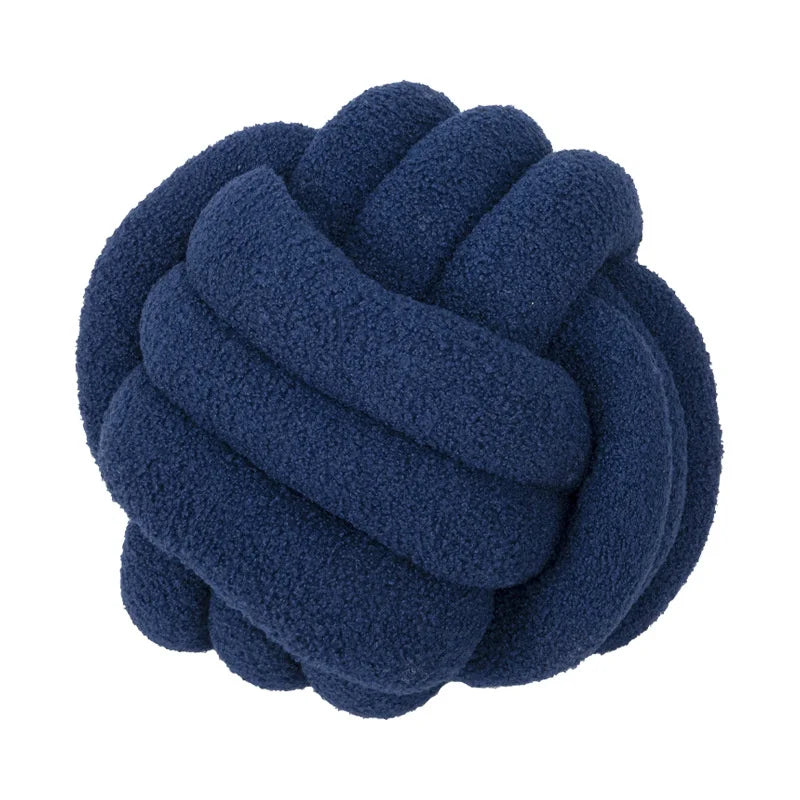 Blue knotted object on a white background